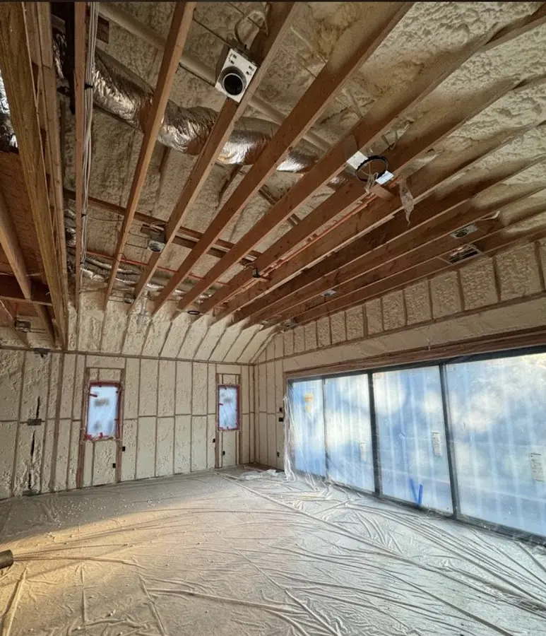 Interior walls and ceiling insulated with spray foam during new construction in Derby